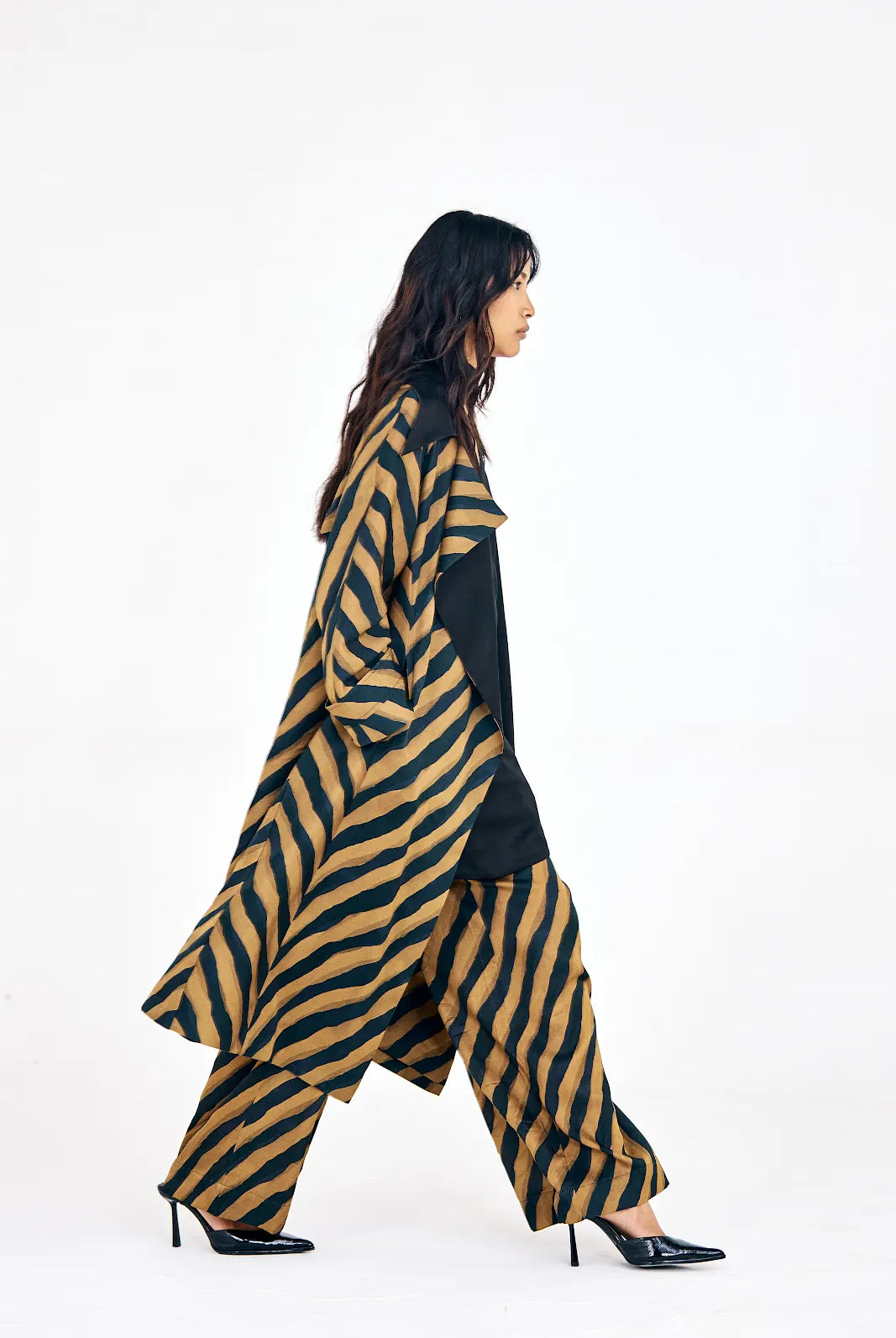 Front view of Verge set with elongated trench and chevron print pants