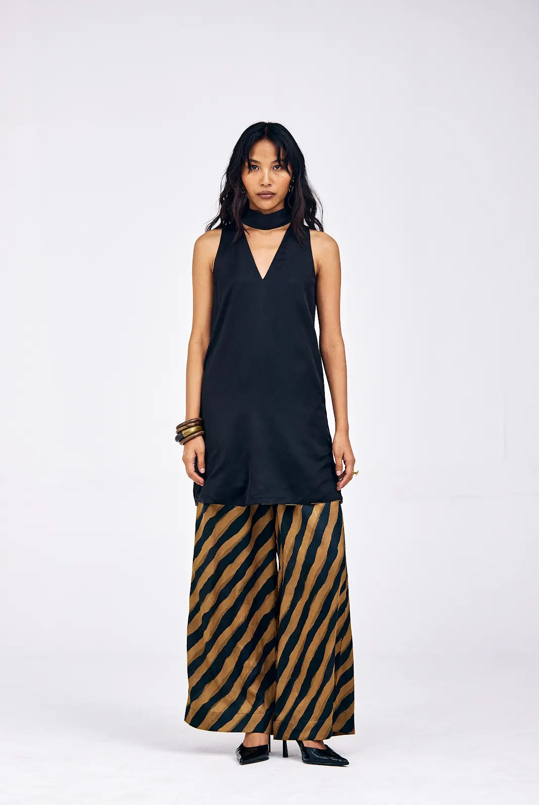 Model wearing XS Verge three-piece co-ord set