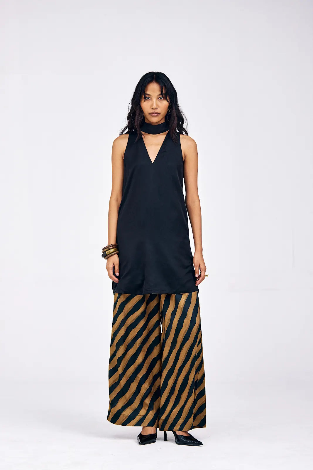 Model wearing XS Verge three-piece co-ord set