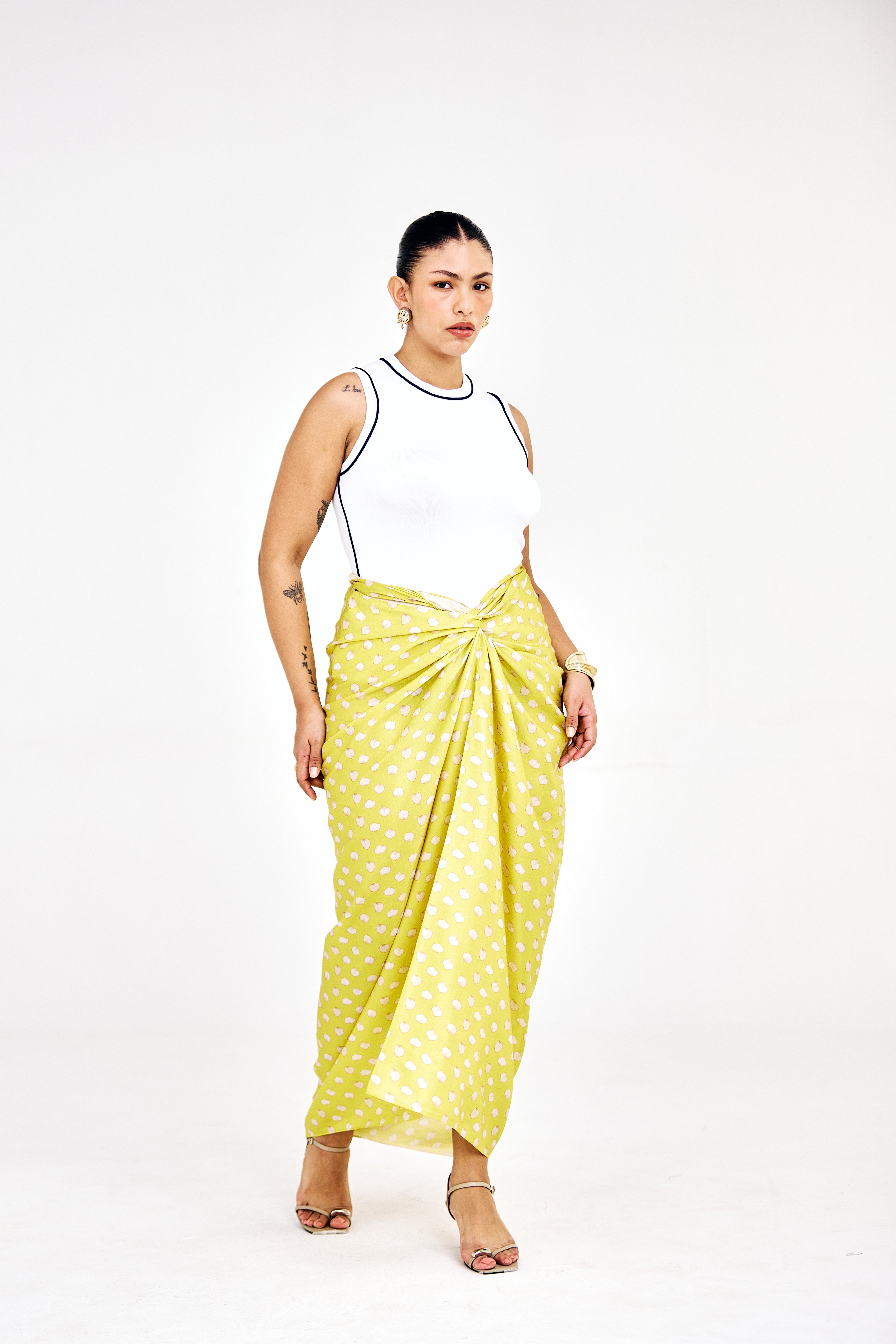 Front view of Tina skirt showcasing fluid drape and wrap silhouette