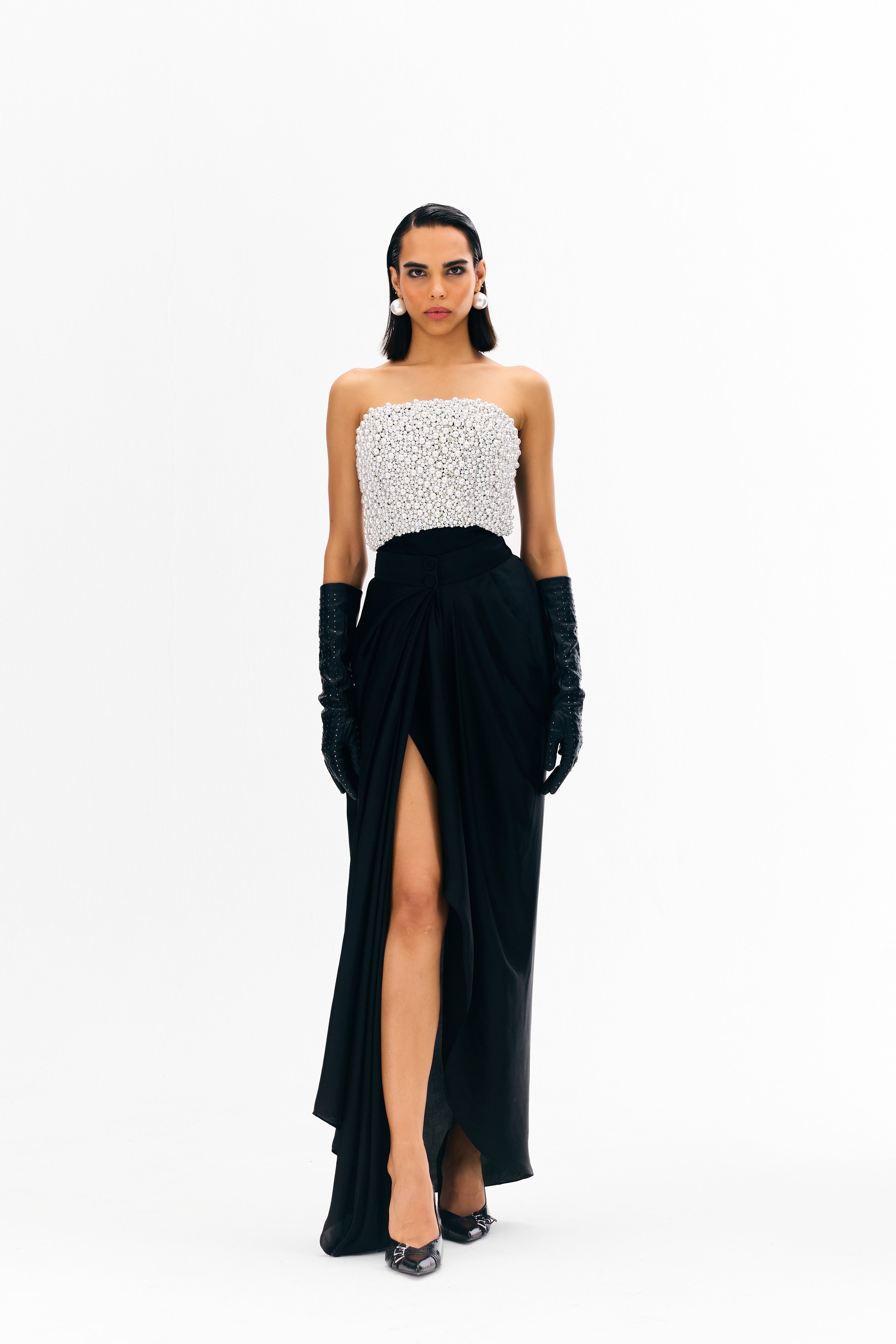 Hand-embroidered tube top with pearls and stone work paired with Lina skirt