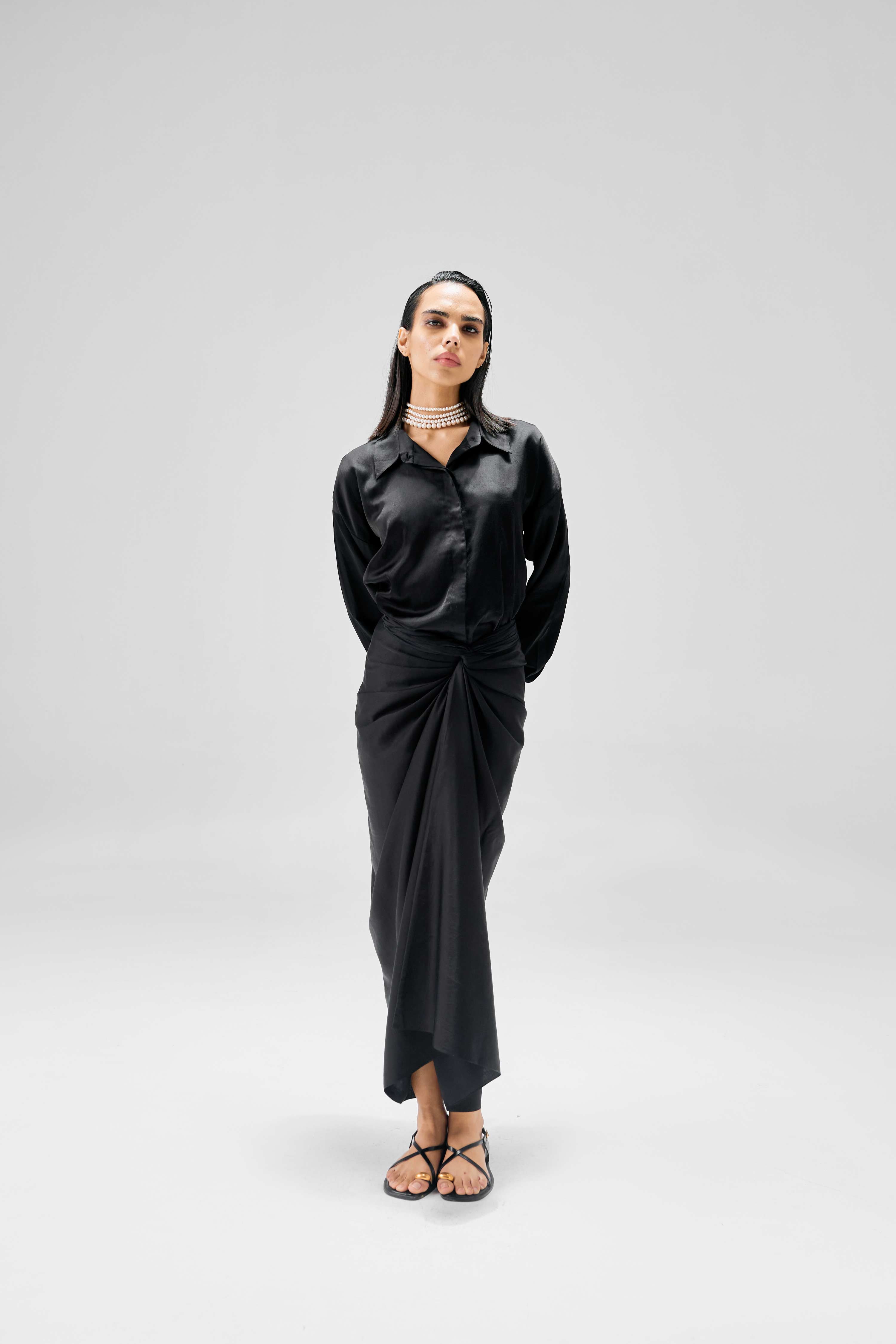 Women’s slim fit shirt styled with versatile tie-up drape skirt