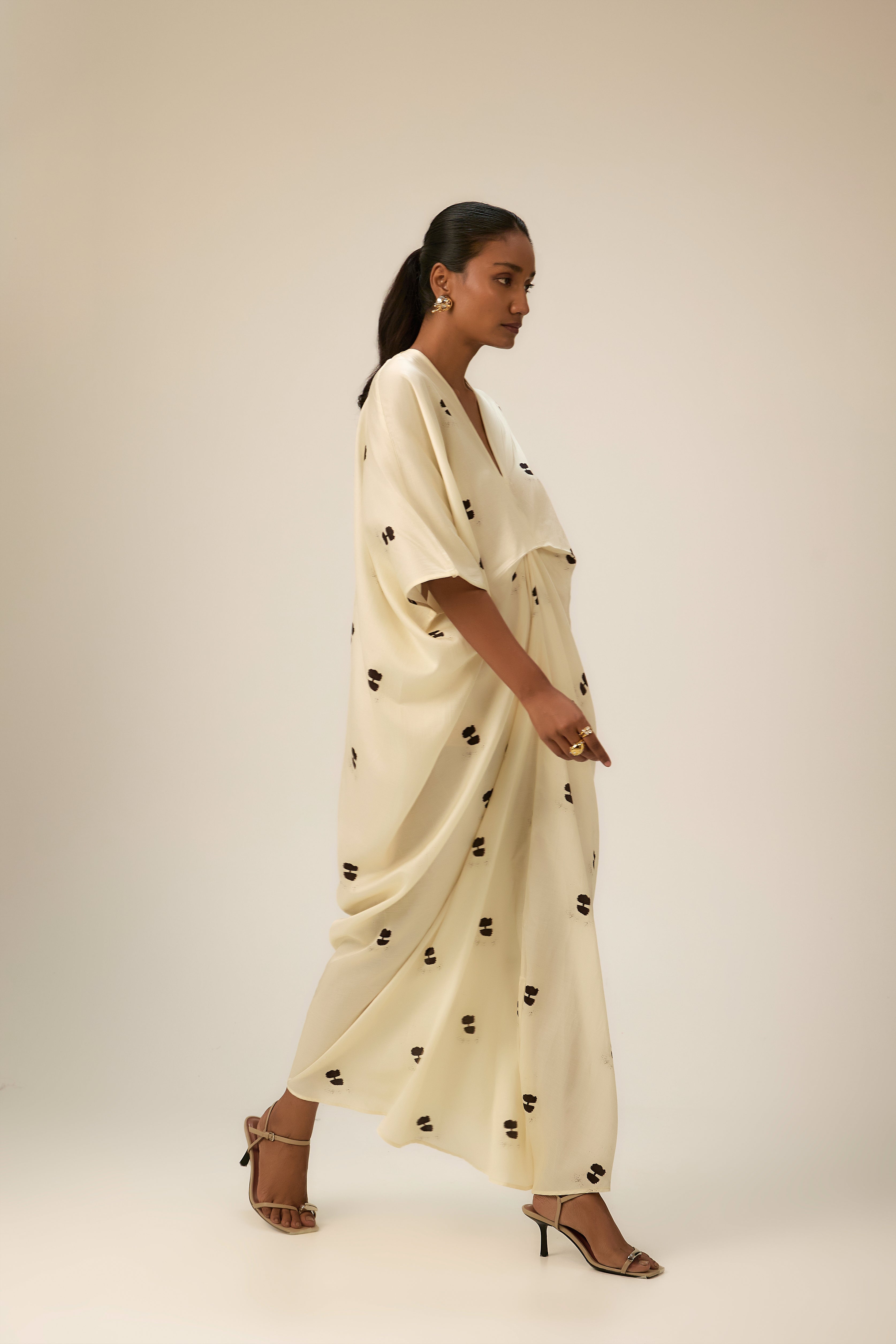 Front view of long cotton modal satin dress with fluid silhouette