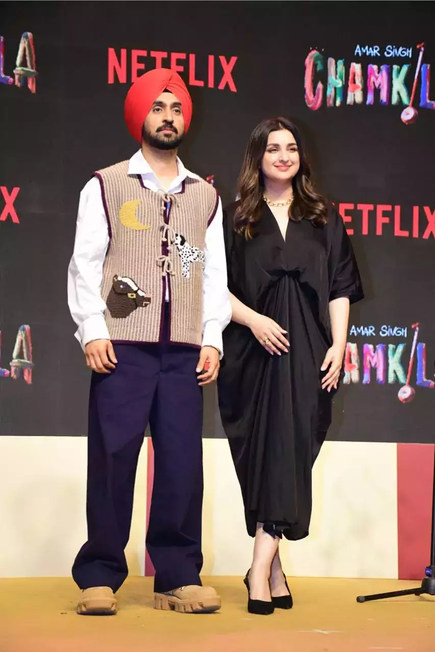 Relaxed-fit dress crafted in cotton modal satin with soft movement