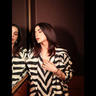 Front view of Oki set with bold striped pattern and oversized lapels